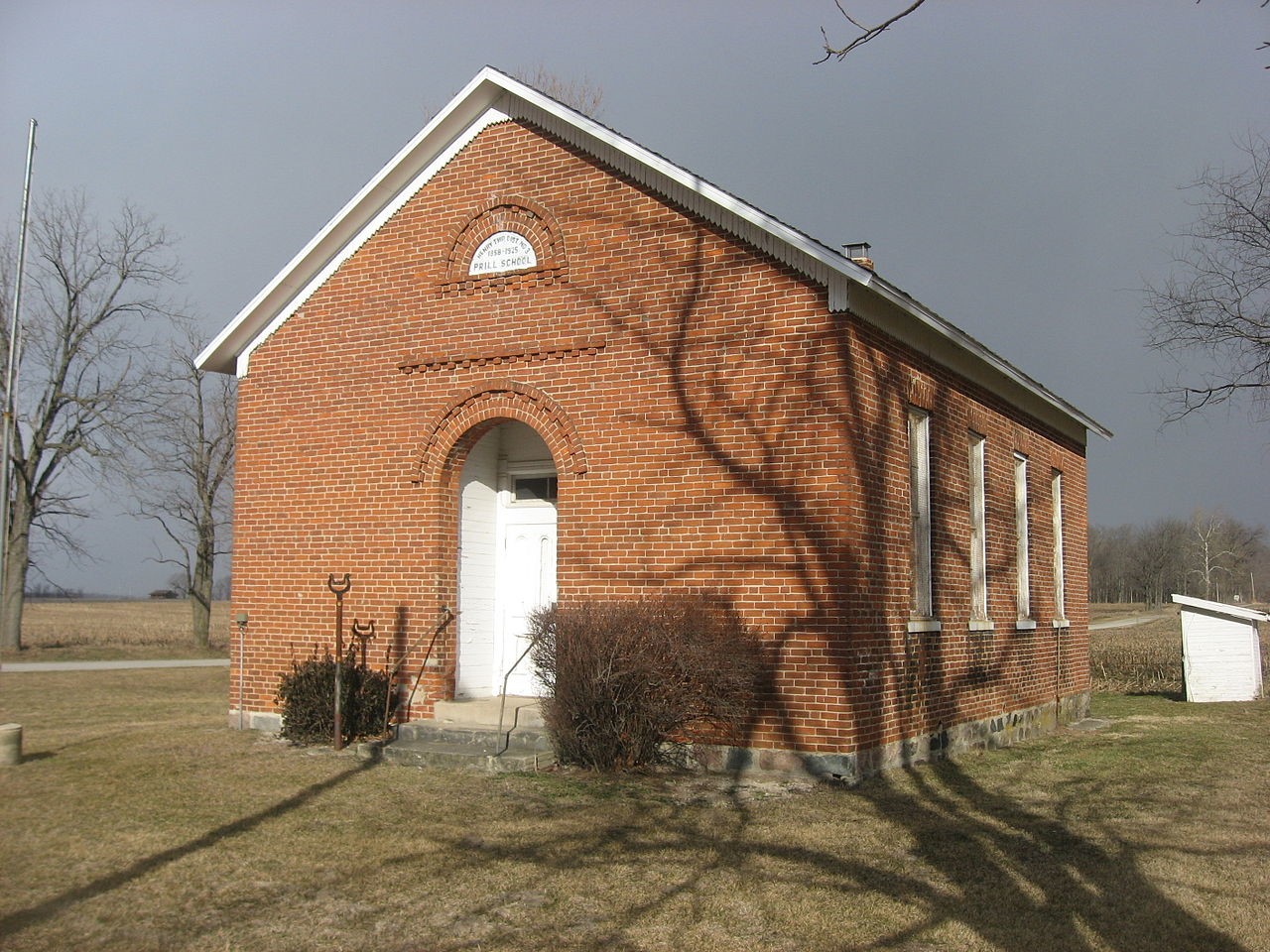 Cover Photo:  Prill School is one room school building near Henry Township close to Akron and Fulton County in Indiana. It was built in 1876 and closed in 1925. The school was restored in 1971 and opened to visitors as a museum. In 1981, the Prill School is on the National Historical Registry.
