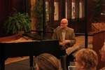 Barnhart and Holland talk-at-the- piano
