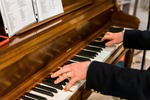 Close-Up of Jeff Barnhart's Hands Playing the Piano by Mississippi State University Libraries