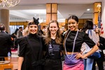 Models Pose with a Designer at the Gatsby Fashion Gala by Mississippi State University Libraries