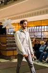 Model Walking the Runway Wearing a Button-Down Shirt a the Gatsby Fashion Gala