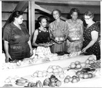 Women with vegetable display