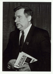 Photograph of Lech Wałęsa holding the Book, Lincoln on Democracy