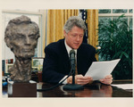 Photograph of President Bill Clinton and Lincoln Bust