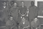Christmas photo of Sonny Montgomery and 6 unidentified soldiers