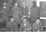 Sonny and six soldiers pose for picture