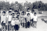 Sonny Montgomery and an unidentified soldier with Vietnamese children