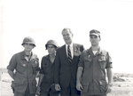 Sonny Montgomery poses with 3 unidentified soldiers
