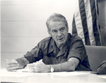 Sonny Montgomery sits at conference table