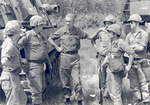 Sonny Montgomery talks with 5 unidentified soldiers