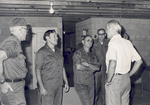 Sonny Montgomery talks with several soldiers