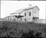 Damaged Cotton Gin by Mississippi Agriculture and Forestry Experiment Station. Delta Branch, Stoneville
