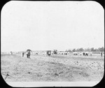 Men With Tractor by Mississippi Agriculture and Forestry Experiment Station. Delta Branch, Stoneville