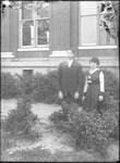 Man and Woman in Garden by Mississippi Agriculture and Forestry Experiment Station. Delta Branch, Stoneville