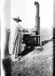 Woman cooking on levee