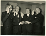 W. F. Dearman (second left), John D. Smith (second right) and Roy Adams (right). by Charles Johnson Faulk Jr.