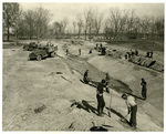 German prisoners of war building Mississippi River model at Clinton during WWII. by Charles Johnson Faulk Jr.