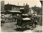 Cotton Wagons at Valley Gin, Levee & Depot Streets, photograph by J. Mack Moore. by Charles Johnson Faulk Jr.