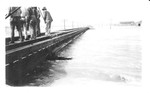 Repairmen working on tracks between Shaw and Leland, Mississippi River Flood 1927.