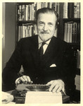 Robert St. John at typewriter