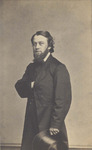Portrait of a Bearded Man in a Black Suit