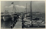 Boats at Anchor in the Yacht Harbor in Gulfport With People Standing on the Dock, Gulfport, Mississippi