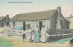 Cabin With People Standing in Front, Wiggins, Mississippi