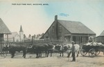 Oxen Drawn Wagon In Front of a Cabin and a Church, Wiggins, Mississippi