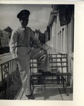 United States Air Force Airman in Uniform Standing on a Balcony