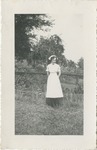 Nurse, Elaine Howell, Standing in Front of a Garden
