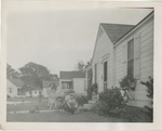 Family Outside Their Home