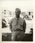 United States Air Force Airman in Uniform, Headshot in Front of a White Wall