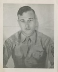 United States Air Force Airman in Uniform, Headshot in Front of a White Wall