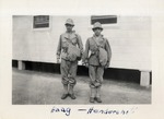 Two Airmen in Casual Uniform Standing at Attention