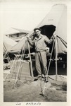 Joe Orlando Standing at the Threshold of a Tent, Keesler Field (Keesler Air Force Base)