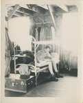 Man Sitting on a Bed