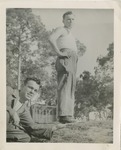 Two Men Posing Outside