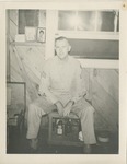 Bill Humberger In Uniform, Sitting on a Bench