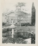 Brick House with a Garden Pond and Statue