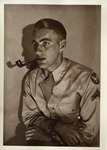 United States Air Force Airman in Uniform, a Tobacco Pipe in His Mouth