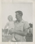 A Man Holding a Baby