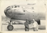 United States Air Force Airplane, "Urgin Virgin II", with Two Men Shaking Hands