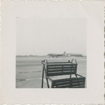 Airplane on the Tarmac with a Ladder in the Foreground