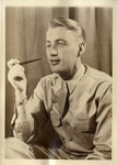 United States Air Force, Blonde Airman in Uniform Holding a Tobacco Pipe