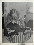 Woman in a Striped Dress, Playing the Guitar