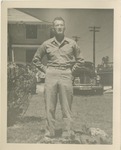United States Air Force Airman in Uniform, Posing Outside in Front of a Car and Building