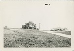 Two Houses at the End of a Long Driveway