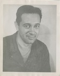 Headshot of a Dark Haired Man