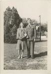 United States Airman in Uniform Poses with a Woman