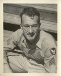 United States Air Force Airman in Uniform, Sitting on Wooden Steps